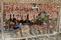stall with dried fish at fishing village