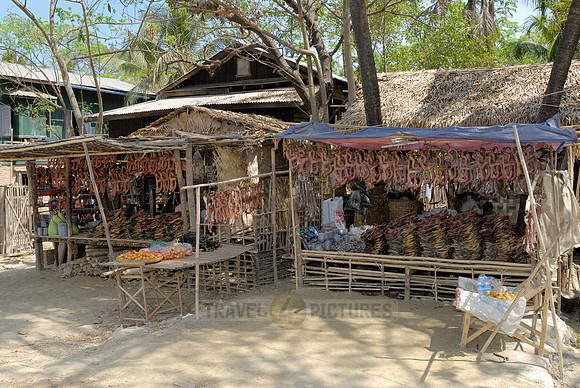 stall with dried fish at fishing village