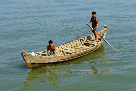 young men with rowing boat