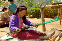 woman weaves using a traditional loom, Palaung tribe