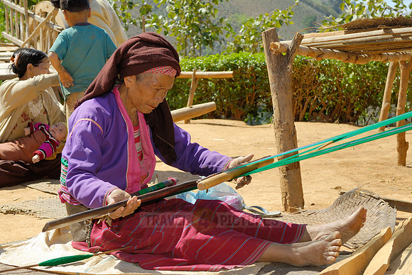 woman weaves using a traditional loom, Palaung tribe