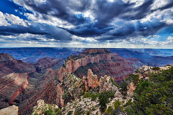 thunderstorm and sun beams over Grand Canyon
