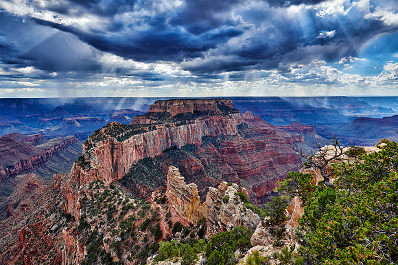 thunderstorm and sun beams over Grand Canyon