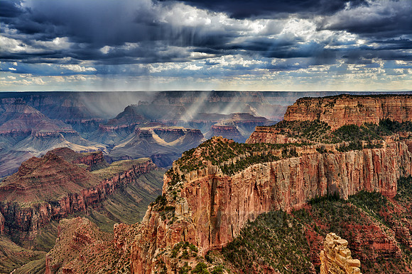 thunderstorm and sun beams over Grand Canyon