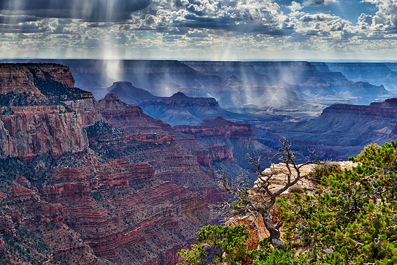 thunderstorm and sun beams over Grand Canyon