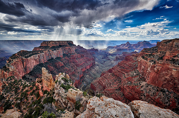 thunderstorm and sun beams over Grand Canyon