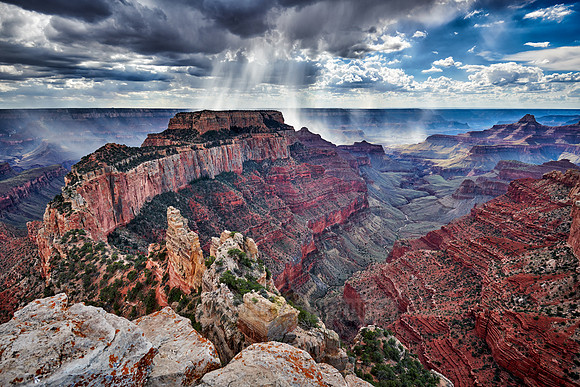 thunderstorm and sun beams over Grand Canyon
