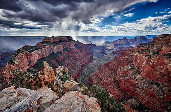 thunderstorm and sun beams over Grand Canyon