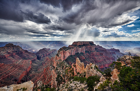 thunderstorm and sun beams over Grand Canyon