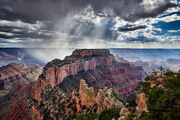 thunderstorm and sun beams over Grand Canyon