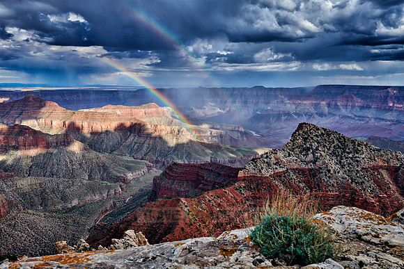 thunderstorm and rainbow over Grand Canyon