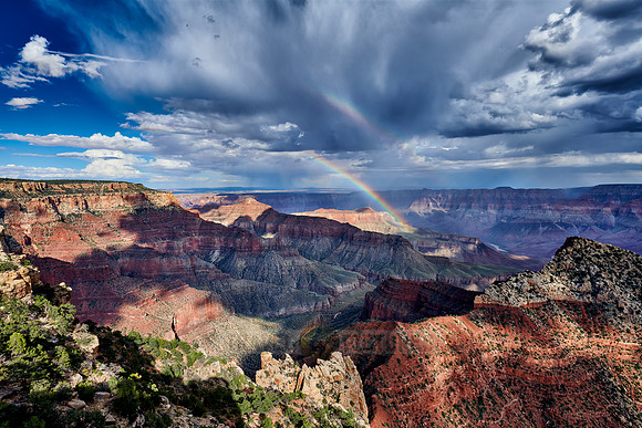 thunderstorm and rainbow over Grand Canyon