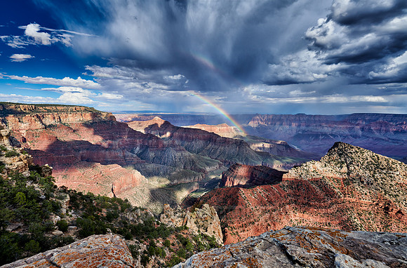 thunderstorm and rainbow over Grand Canyon