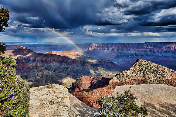 thunderstorm and rainbow over Grand Canyon