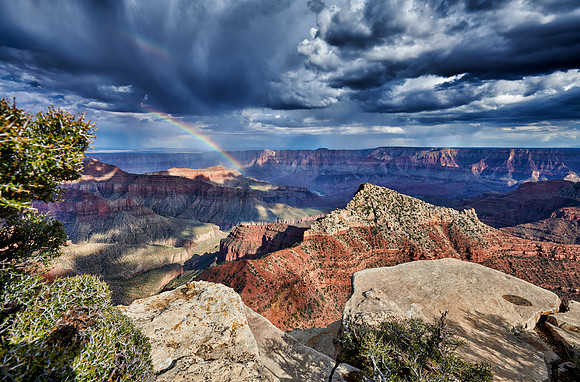 thunderstorm and rainbow over Grand Canyon