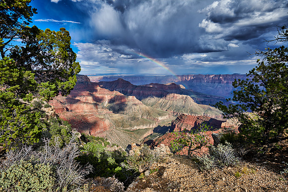 thunderstorm and rainbow over Grand Canyon