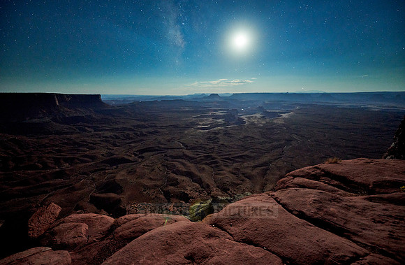night sky with moon over Canyonlands National Park, Island in the Sky