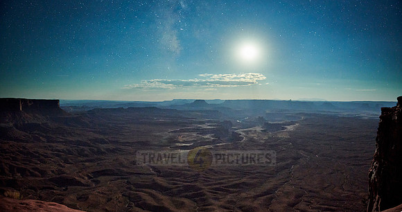 night sky with moon over Canyonlands National Park, Island in the Sky