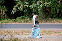 Local woman with child in colorful clothes