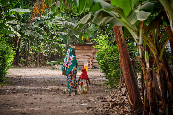 Local woman with child in colorful clothes