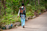 Local woman with child in colorful clothes