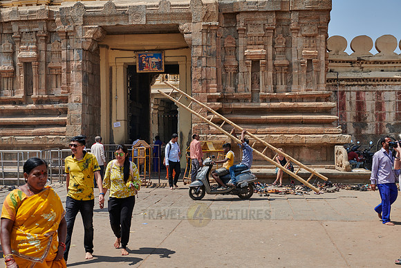 locals with ladder on motorbike