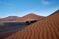 strong blowing wind over sand dunes of Namib desert