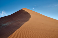 strong blowing wind over sand dunes of Namib desert