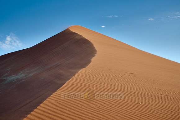 strong blowing wind over sand dunes of Namib desert
