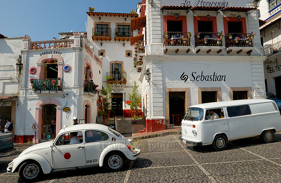 VW bus or VW Beetle in the cityscape of Taxco