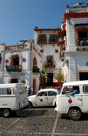 VW bus or VW Beetle in the cityscape of Taxco