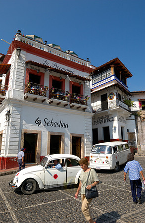 VW bus or VW Beetle in the cityscape of Taxco