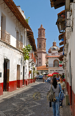 City view with San Sebastian y Santa Prisca Church and typical buildings