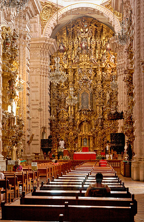 heavily decorated high altar made of gold leaf of the Church of San Sebastian y Santa Prisca
