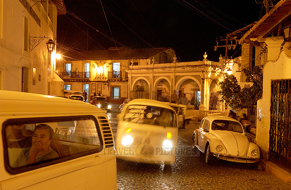 Plazuela de Bernal at dawn, taxi VW bus and VW beetle