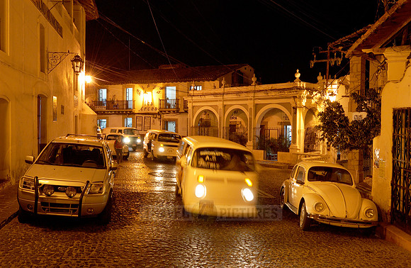 Plazuela de Bernal at dawn, taxi VW bus and VW beetle