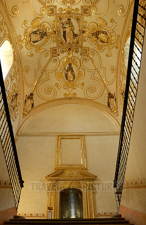 stucco and gold decorations in the stairwell of the former Santo Domingo convent