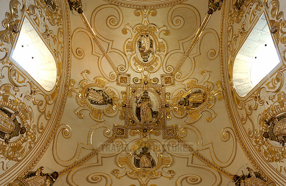stucco and gold decorations in the stairwell of the former Santo Domingo convent