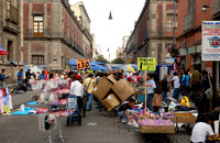 market stalls and lots of pedestrians