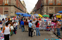 market stalls and lots of pedestrians