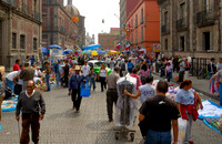 market stalls and lots of pedestrians