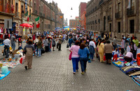 market stalls and lots of pedestrians
