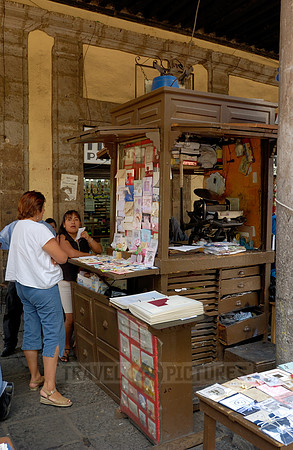 stalls with print products on Plaza Santo Domingo