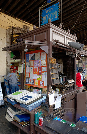 stalls with print products on Plaza Santo Domingo