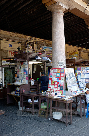 stalls with print products on Plaza Santo Domingo
