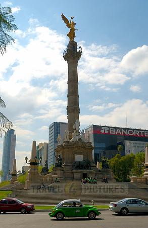Independence Monument El Angel with surrounding office buildings