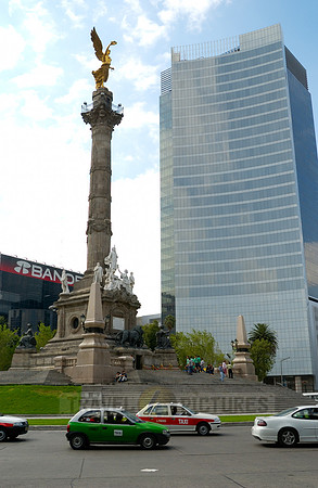 Independence Monument El Angel with surrounding office buildings