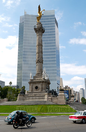 Independence Monument El Angel with surrounding office buildings