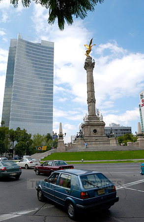 Independence Monument El Angel with surrounding office buildings