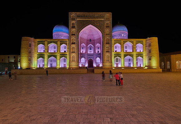 colorful illuminated ensemble of Mir-i Arab-Madressa Kalyan-Mosque and minaret